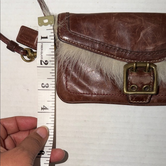 Coach Shearling Galaxy Chestnut Brown
Leather Buckle Wristlet Wallet - Picture 8 of 8